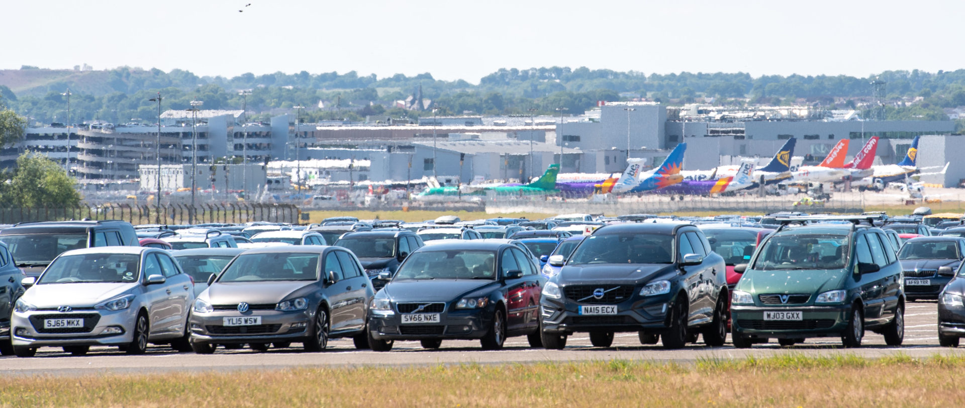 Edinburgh Airport car park with planes in the background